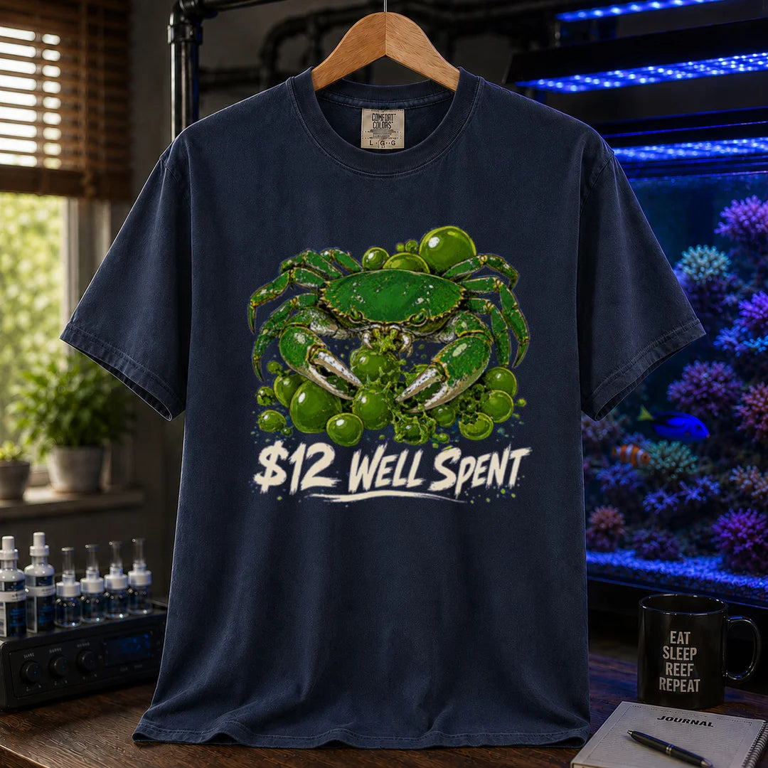 Saltwater aquarium graphic t-shirt featuring an illustration of an emerald crab with text: $12 WELL SPENT, navy crew neck tee