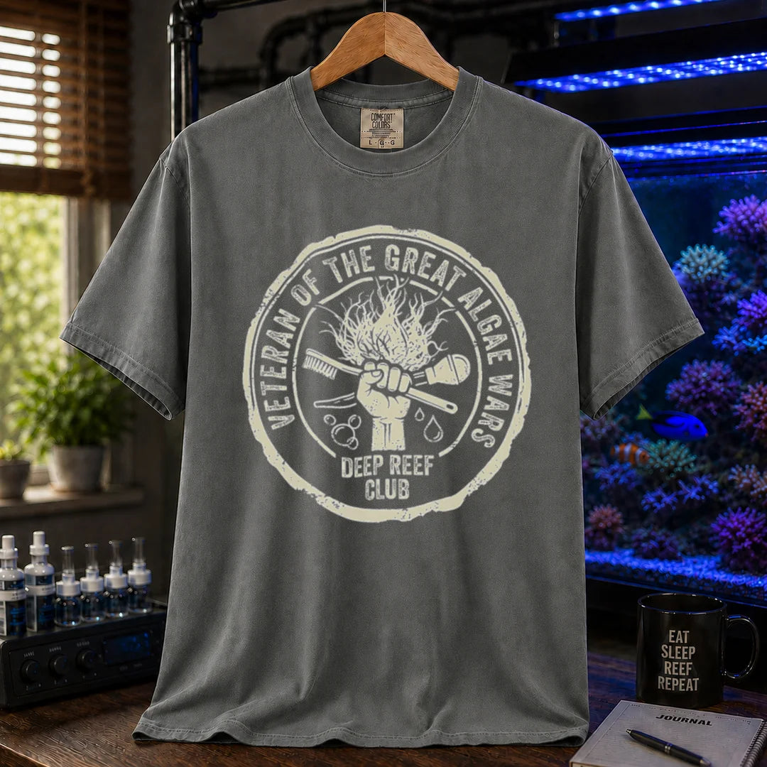 Saltwater aquarium graphic t-shirt featuring a circular emblem illustration with text: VETERAN OF THE GREAT ALGAE WARS DEEP REEF CLUB, grey crew neck tee