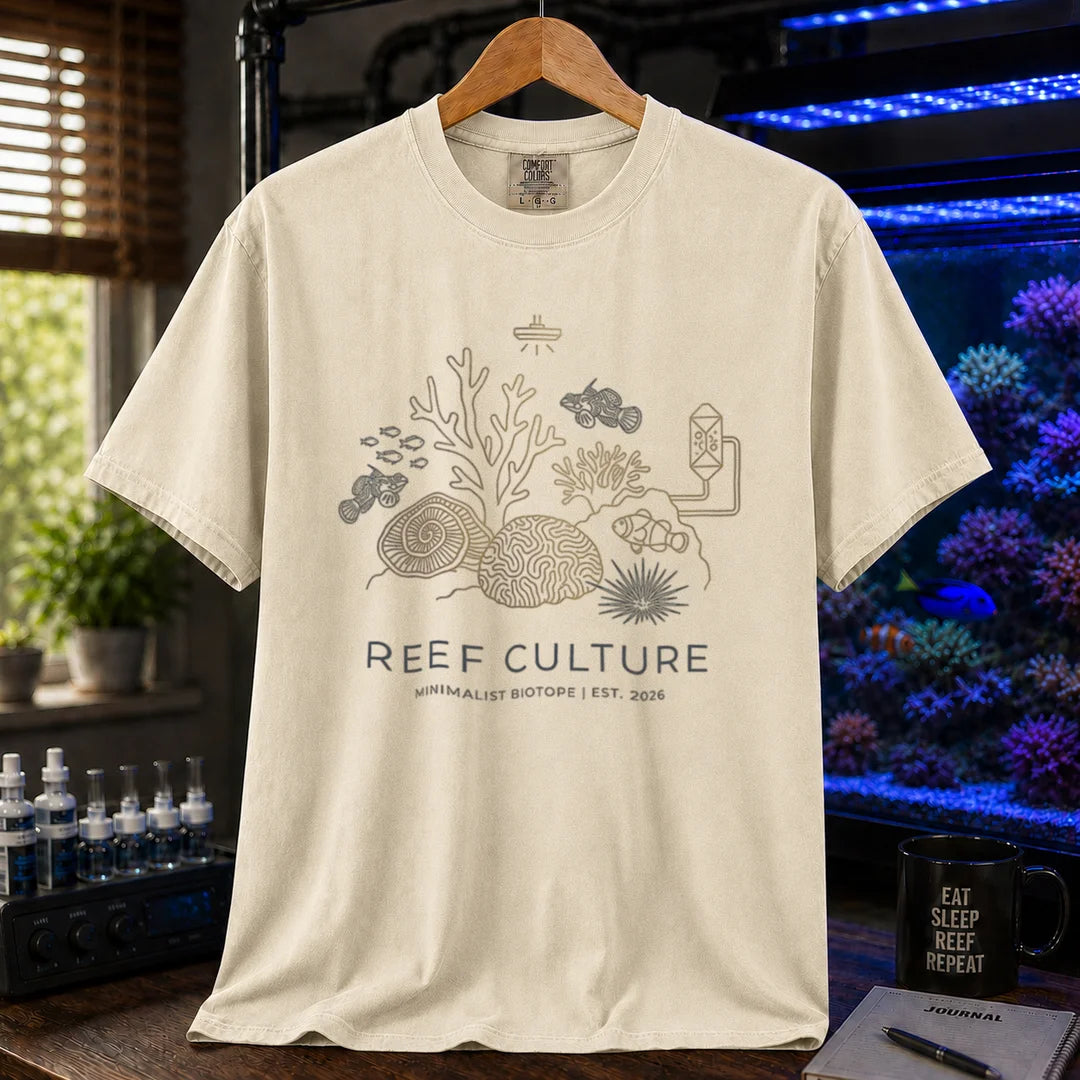 Saltwater aquarium graphic t-shirt featuring a minimalist line-art biotope illustration and text: REEF CULTURE MINIMALIST BIOTOPE | EST. 2026, ivory crew neck tee