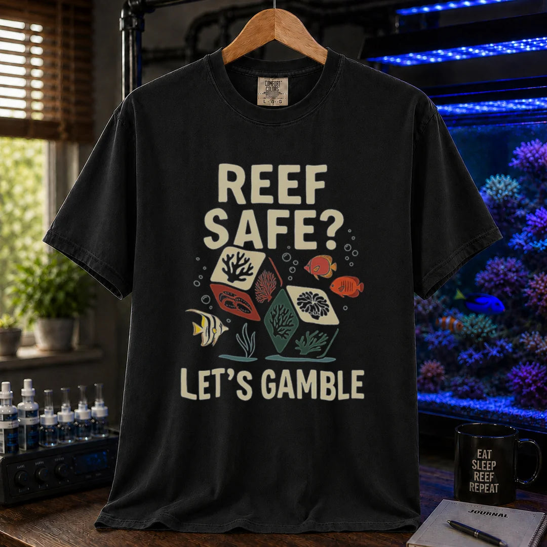 Saltwater aquarium graphic t-shirt featuring coral dice and fish illustrations with text: REEF SAFE? LET'S GAMBLE, black crew neck tee