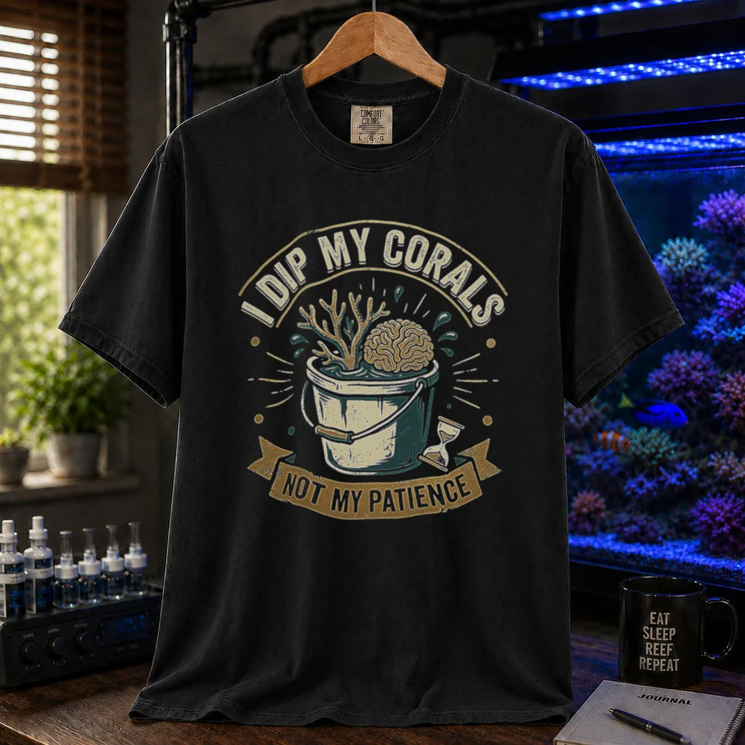 Saltwater aquarium graphic t-shirt featuring a bucket illustration and text: I DIP MY CORALS, NOT MY PATIENCE, black crew neck tee