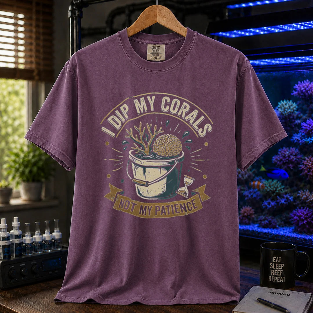 Saltwater aquarium graphic t-shirt featuring a bucket illustration and text: I DIP MY CORALS, NOT MY PATIENCE, purple crew neck tee