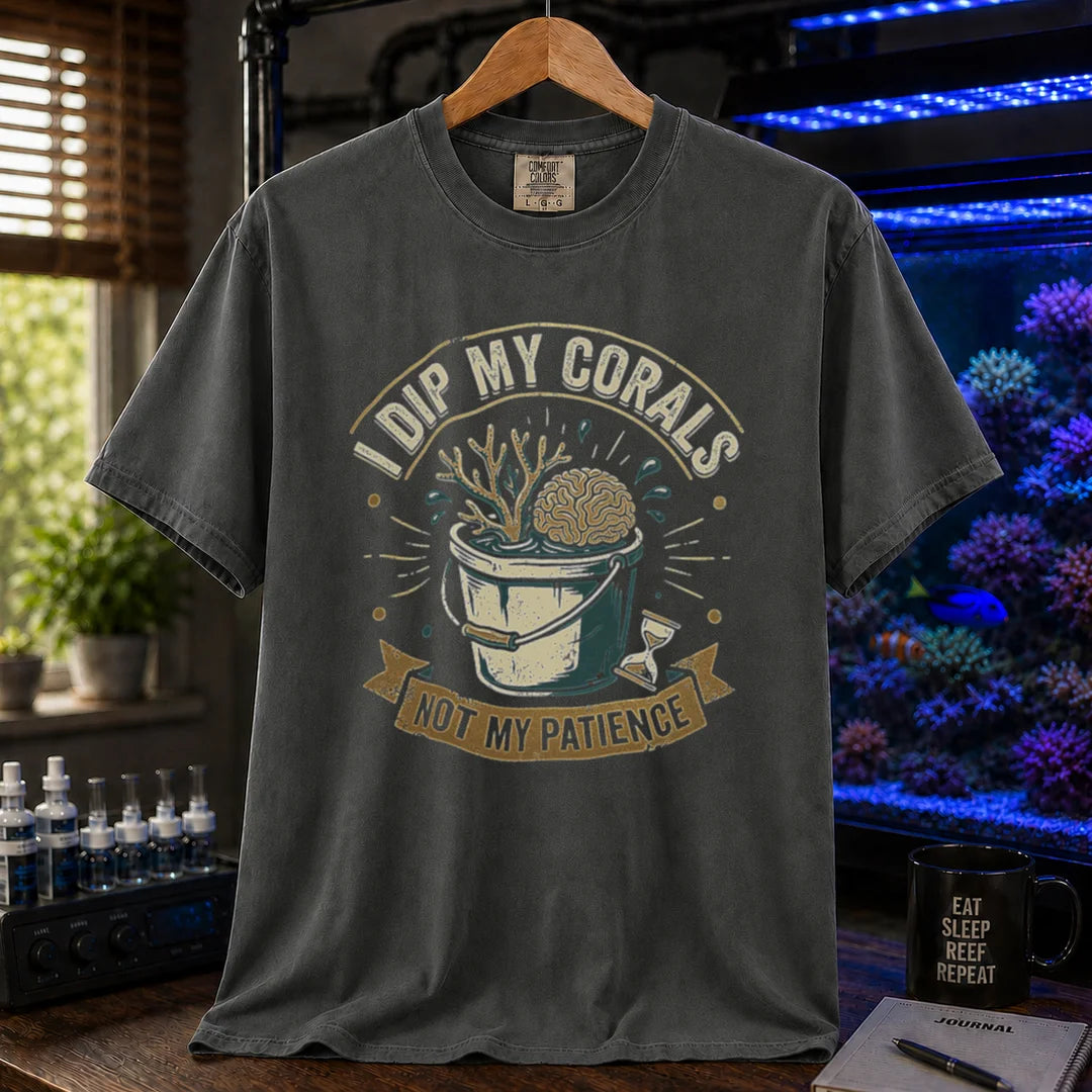 Saltwater aquarium graphic t-shirt featuring a bucket illustration and text: I DIP MY CORALS, NOT MY PATIENCE, khaki crew neck tee