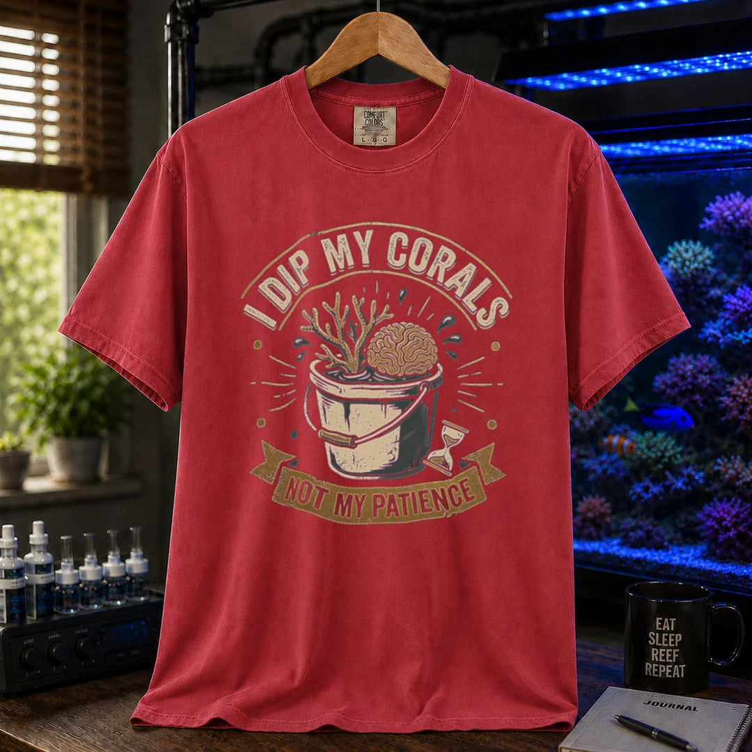 Saltwater aquarium graphic t-shirt featuring a bucket illustration and text: I DIP MY CORALS, NOT MY PATIENCE, red crew neck tee