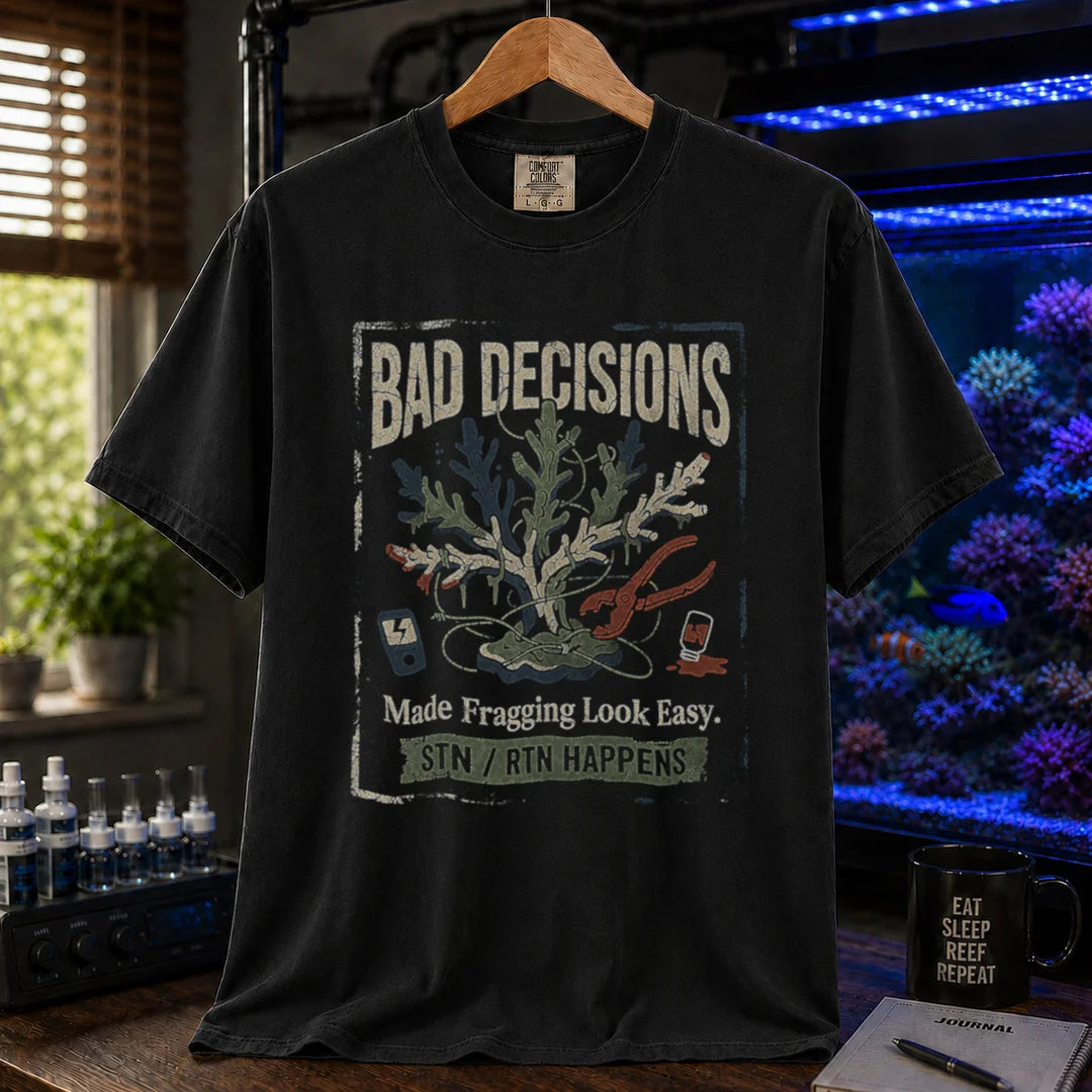 Saltwater aquarium graphic t-shirt featuring a distressed fragging illustration with tools and text: BAD DECISIONS Made Fragging Look Easy. STN / RTN HAPPENS, black crew neck tee