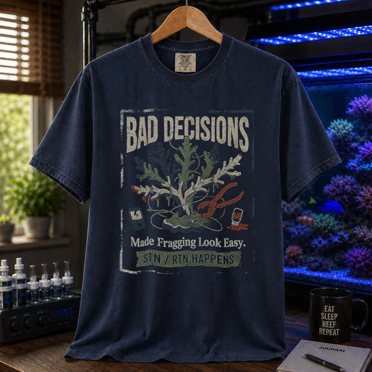Saltwater aquarium graphic t-shirt featuring a distressed fragging illustration with tools and text: BAD DECISIONS Made Fragging Look Easy. STN / RTN HAPPENS, navy crew neck tee