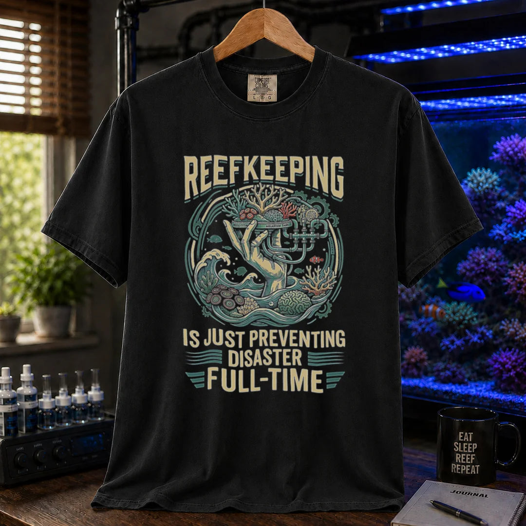 Saltwater aquarium graphic t-shirt featuring an intricate illustration and text: REEFKEEPING IS JUST PREVENTING DISASTER FULL-TIME, black crew neck tee
