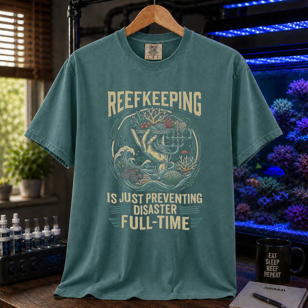 Saltwater aquarium graphic t-shirt featuring an intricate illustration and text: REEFKEEPING IS JUST PREVENTING DISASTER FULL-TIME, green crew neck tee