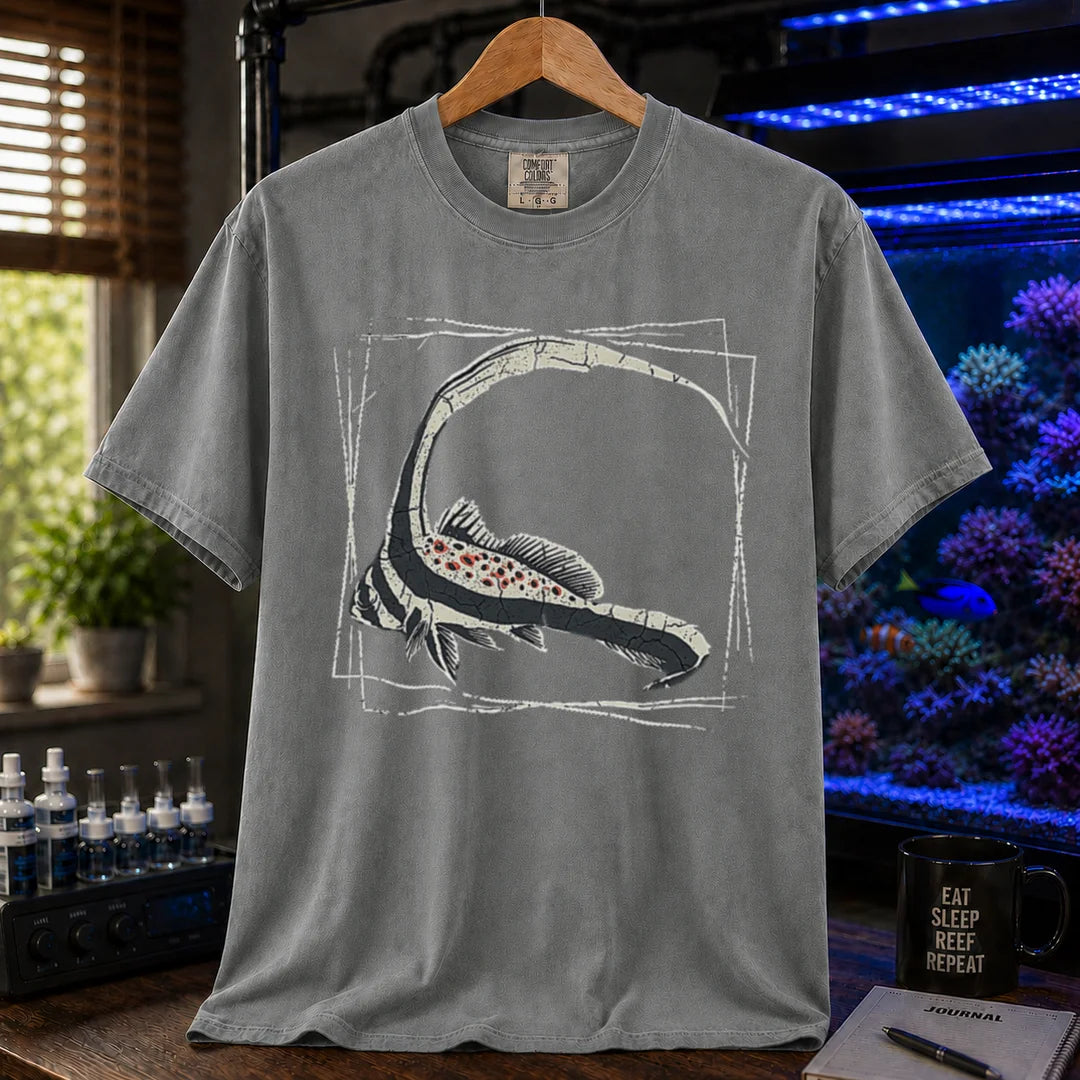 Saltwater aquarium graphic t-shirt featuring a detailed illustration of a spotted drum fish inside a geometric frame, grey crew neck tee