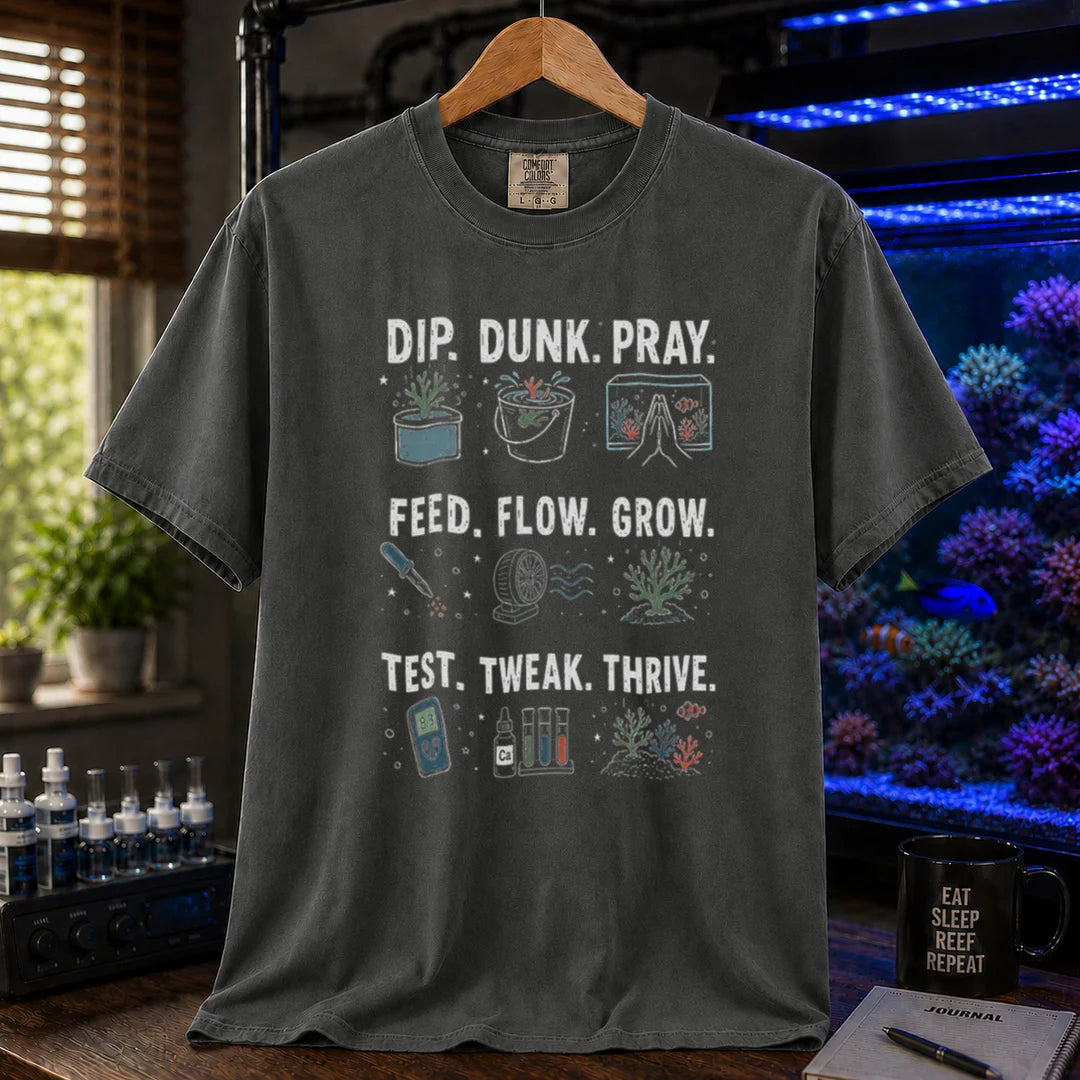 Saltwater aquarium graphic t-shirt featuring multi-step routine icons and text: DIP. DUNK. PRAY. FEED. FLOW. GROW. TEST. TWEAK. THRIVE., grey crew neck tee