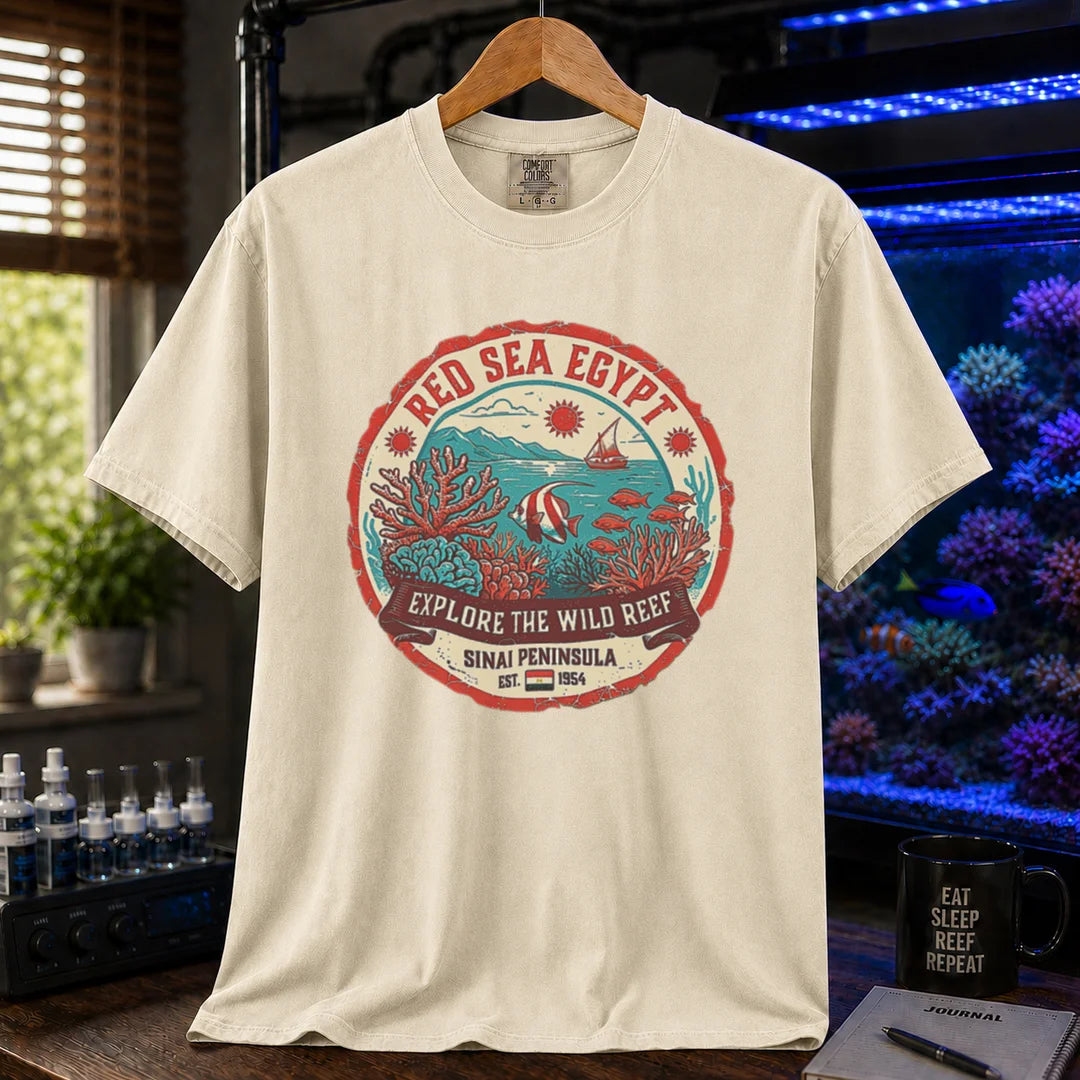 Saltwater aquarium graphic t-shirt featuring a vintage Red Sea Egypt circular emblem and text: RED SEA EGYPT EXPLORE THE WILD REEF, cream, beige, ivory crew neck tee