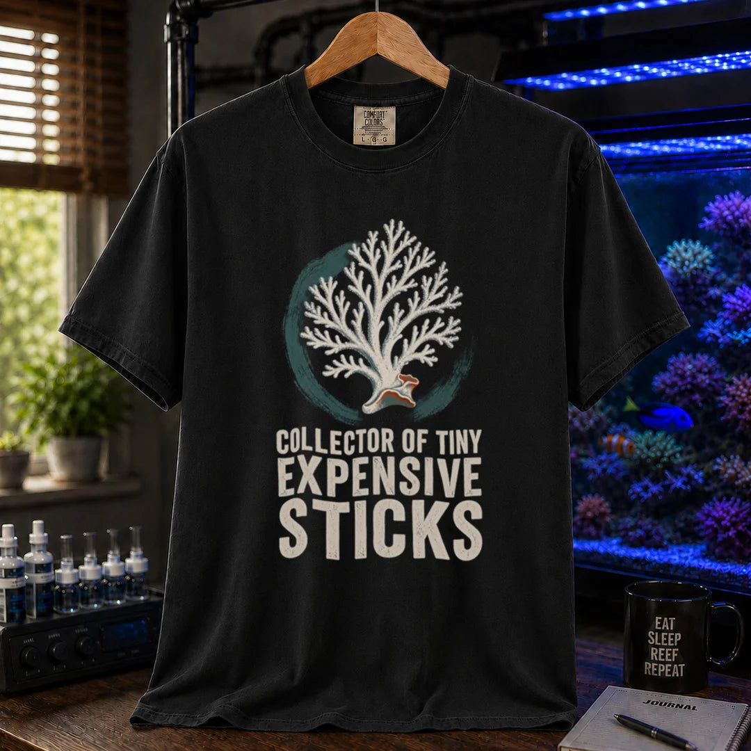 Saltwater aquarium graphic t-shirt featuring an SPS coral illustration and text: COLLECTOR OF TINY EXPENSIVE STICKS, black crew neck tee