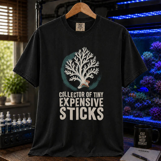 Saltwater aquarium graphic t-shirt featuring an SPS coral illustration and text: COLLECTOR OF TINY EXPENSIVE STICKS, black crew neck tee