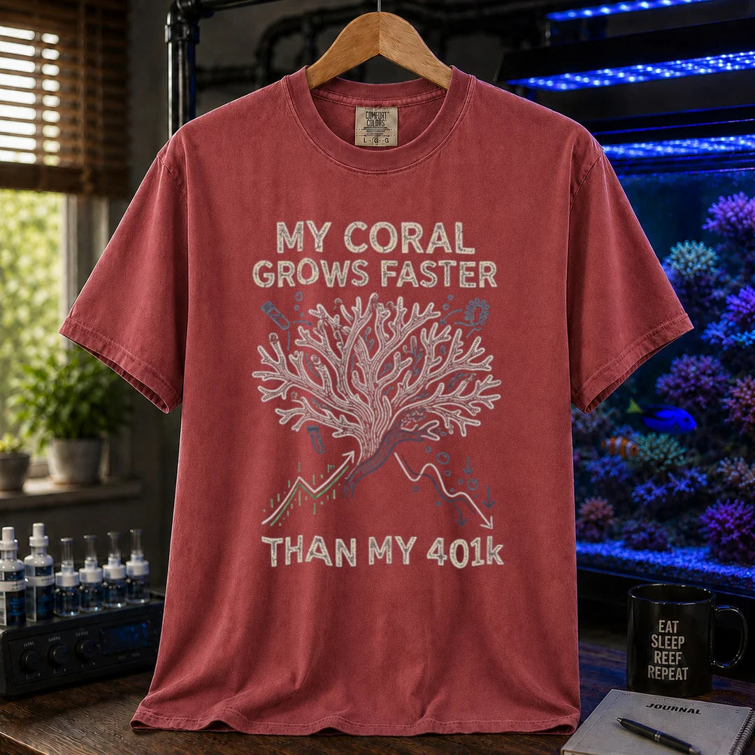 Saltwater aquarium graphic t-shirt featuring a branching coral illustration with stock chart graphs and text: MY CORAL GROWS FASTER THAN MY 401k, maroon, red crew neck tee