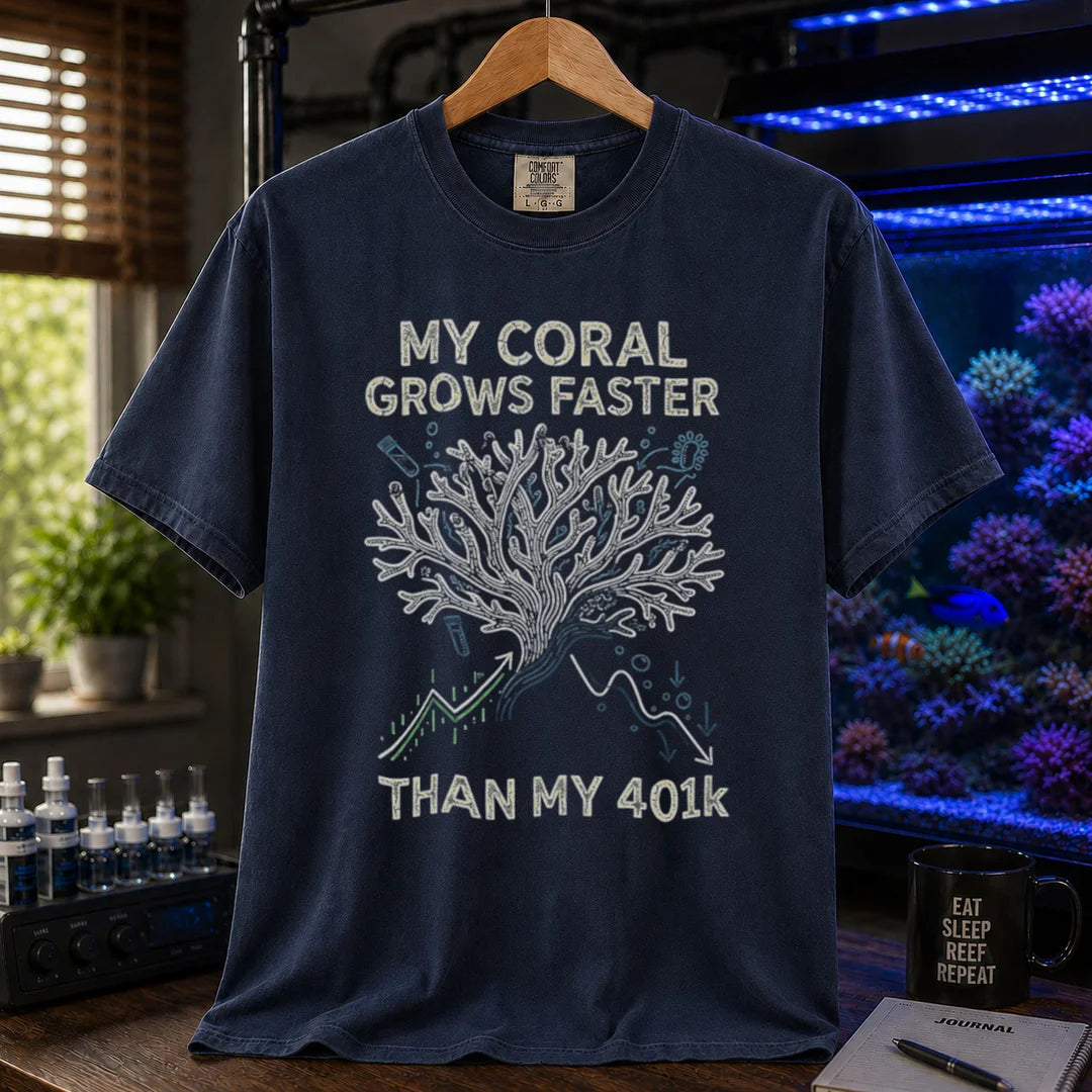Saltwater aquarium graphic t-shirt featuring a branching coral illustration with stock chart graphs and text: MY CORAL GROWS FASTER THAN MY 401k, navy crew neck tee