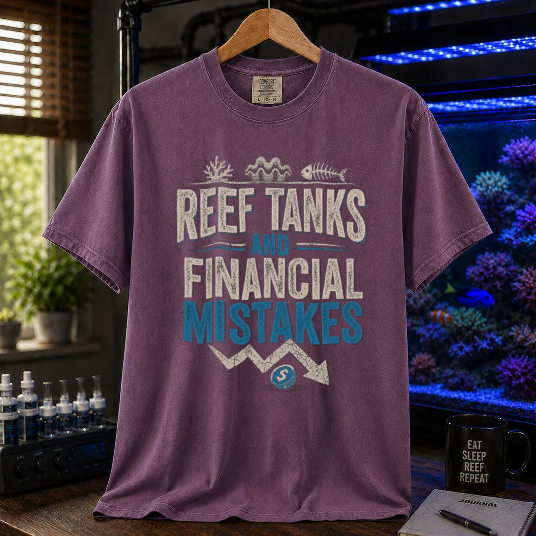 Saltwater aquarium graphic t-shirt featuring financial chart graphics and text: REEF TANKS AND FINANCIAL MISTAKES, purple crew neck tee