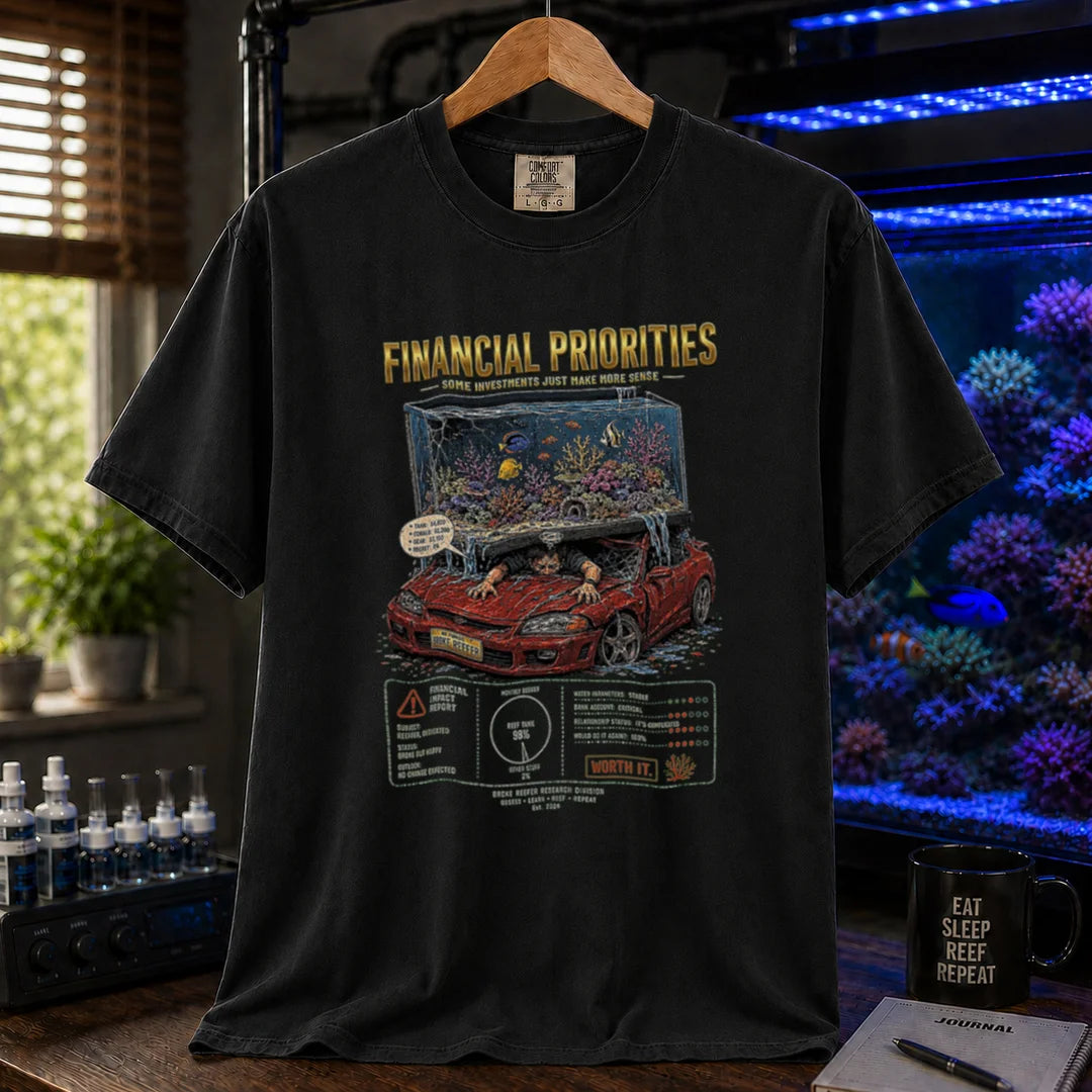 Saltwater aquarium graphic t-shirt featuring a reef tank crushing a car illustration and text: FINANCIAL PRIORITIES, black crew neck tee