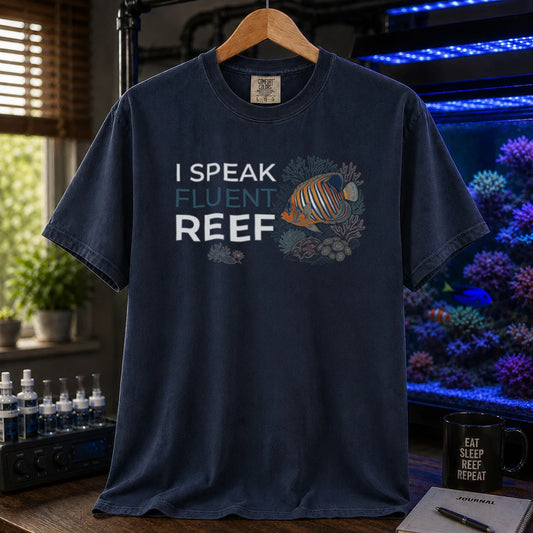 Saltwater aquarium graphic t-shirt featuring an angelfish and coral illustration with text: I SPEAK FLUENT REEF, navy crew neck tee