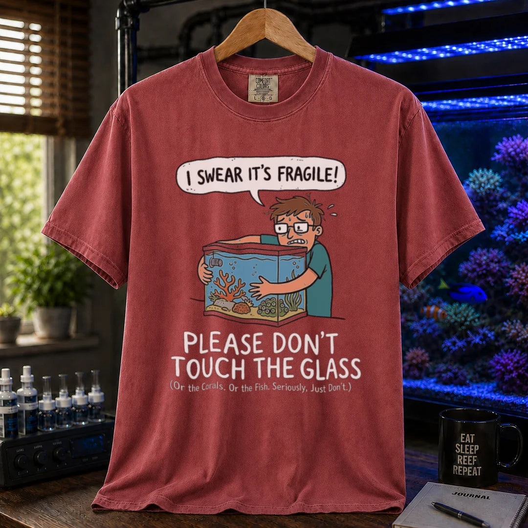 Saltwater aquarium graphic t-shirt featuring an anxious aquarist hugging a tank illustration and text: I SWEAR IT'S FRAGILE! PLEASE DON'T TOUCH THE GLASS, maroon, red crew neck tee
