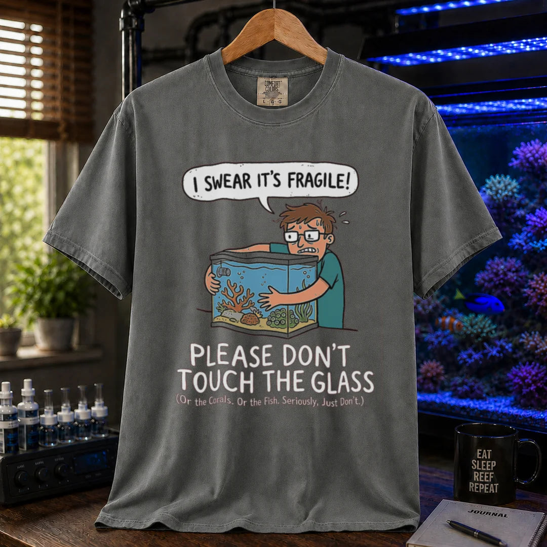 Saltwater aquarium graphic t-shirt featuring an anxious aquarist hugging a tank illustration and text: I SWEAR IT'S FRAGILE! PLEASE DON'T TOUCH THE GLASS, grey crew neck tee