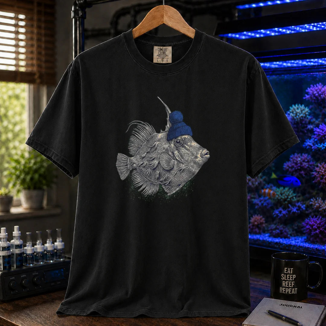 Saltwater aquarium graphic t-shirt featuring a filefish wearing a blue beanie illustration, black crew neck te