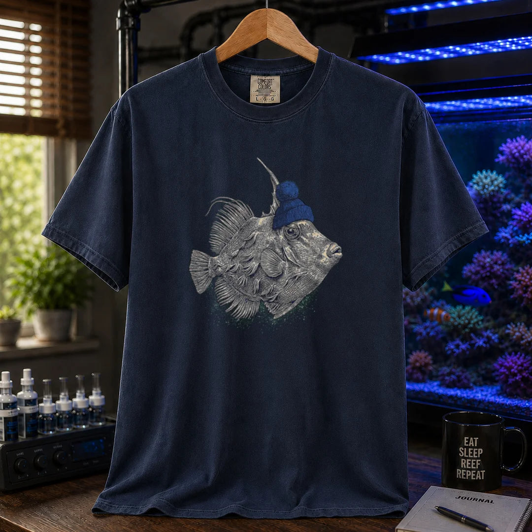 Saltwater aquarium graphic t-shirt featuring a filefish wearing a blue beanie illustration, [Color] crew neck te