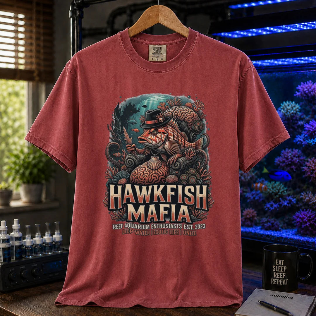 Saltwater aquarium graphic t-shirt featuring a hawkfish in a fedora mob boss illustration and text: HAWKFISH MAFIA, maroon, red crew neck tee