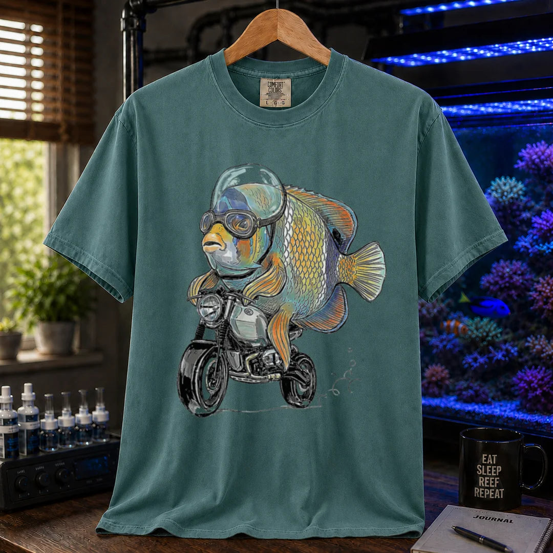 Saltwater aquarium graphic t-shirt featuring a wrasse in goggles and helmet riding a motorcycle illustration, green crew neck tee