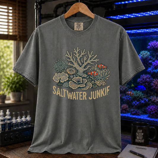 Saltwater aquarium graphic t-shirt featuring a coral reef and clownfish illustration with text: SALTWATER JUNKIE, dark grey crew neck tee