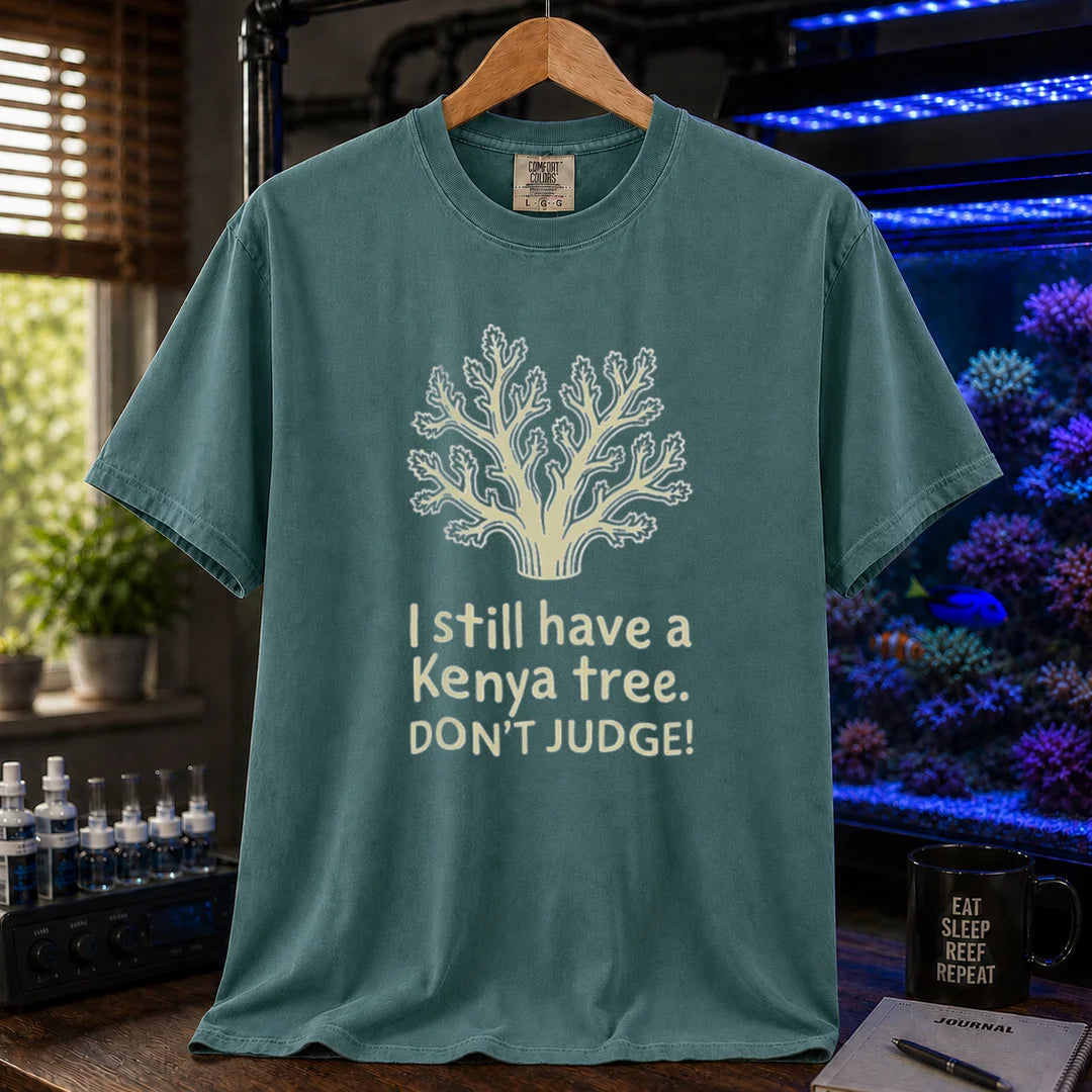Saltwater aquarium graphic t-shirt featuring a Kenya tree coral illustration and text: I still have a Kenya tree. DON'T JUDGE!, green crew neck tee