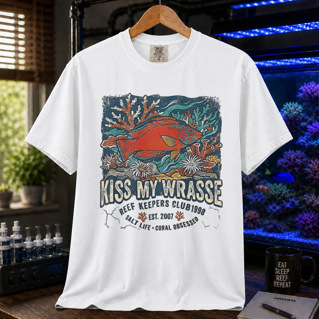 Saltwater aquarium graphic t-shirt featuring a wrasse and coral reef illustration with text: KISS MY WRASSE REEF KEEPERS CLUB, white crew neck tee