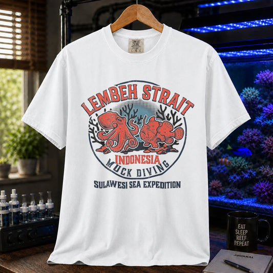 Saltwater aquarium graphic t-shirt featuring an octopus and frogfish illustration with text: LEMBEH STRAIT INDONESIA MUCK DIVING SULAWESI SEA EXPEDITION, white crew neck tee