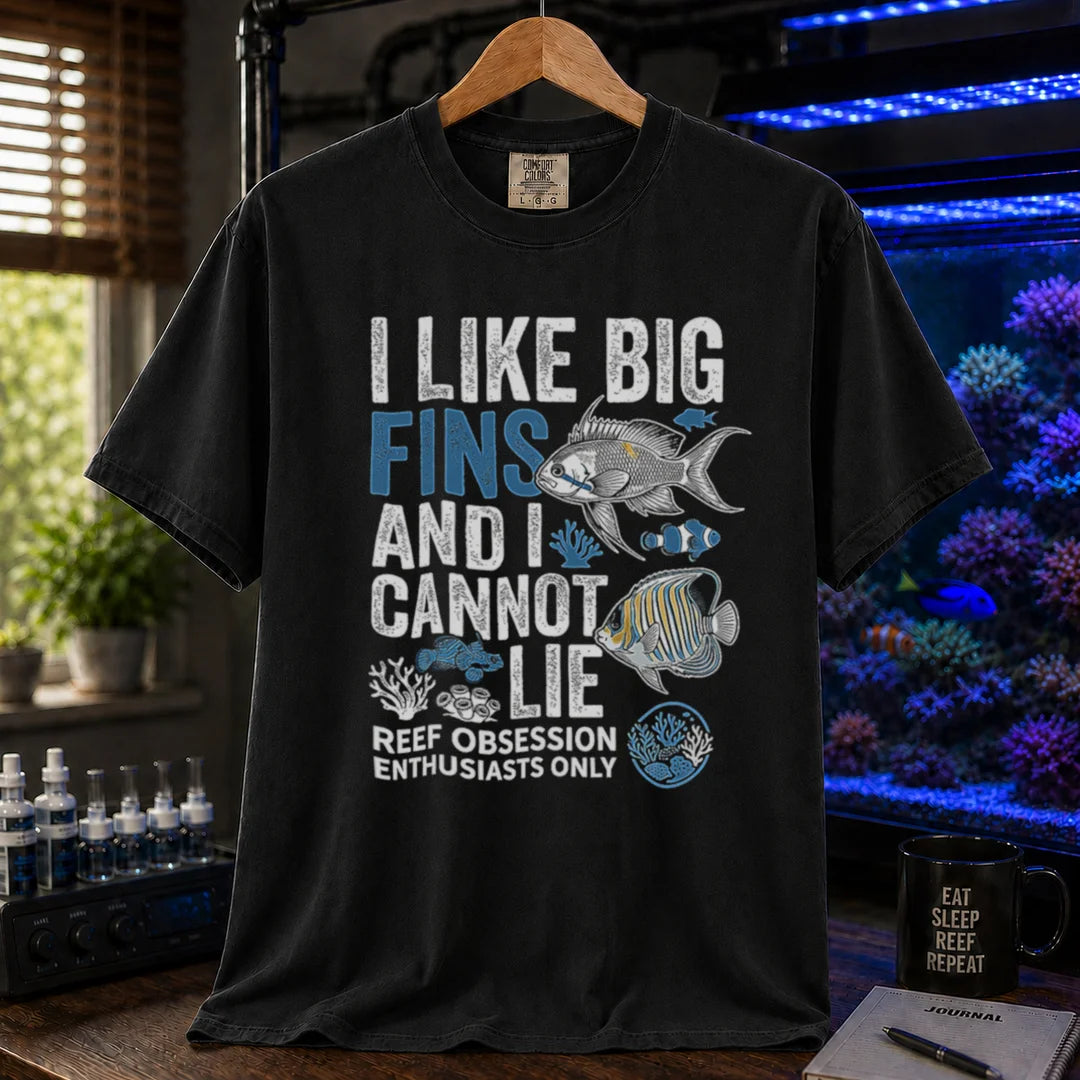 Saltwater aquarium graphic t-shirt featuring marine fish illustrations and text: I LIKE BIG FINS AND I CANNOT LIE REEF OBSESSION ENTHUSIASTS ONLY, black crew neck tee