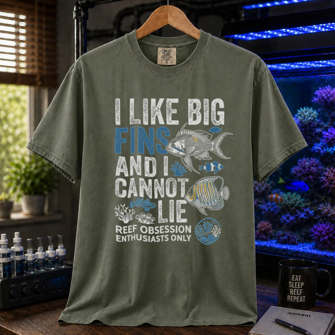 Saltwater aquarium graphic t-shirt featuring marine fish illustrations and text: I LIKE BIG FINS AND I CANNOT LIE REEF OBSESSION ENTHUSIASTS ONLY, military green crew neck tee