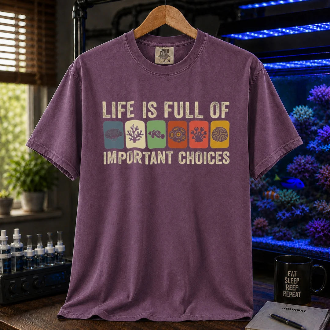 Saltwater aquarium graphic t-shirt featuring colorful coral icons and text: LIFE IS FULL OF IMPORTANT CHOICES, purple crew neck tee