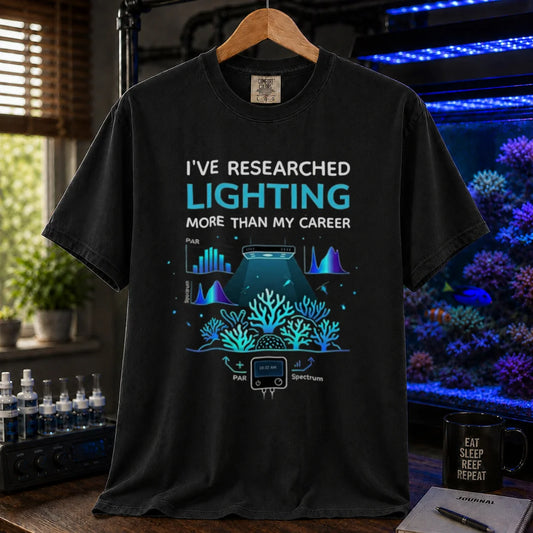 Saltwater aquarium graphic t-shirt featuring lighting and PAR graphs with text: I'VE RESEARCHED LIGHTING MORE THAN MY CAREER, black crew neck tee