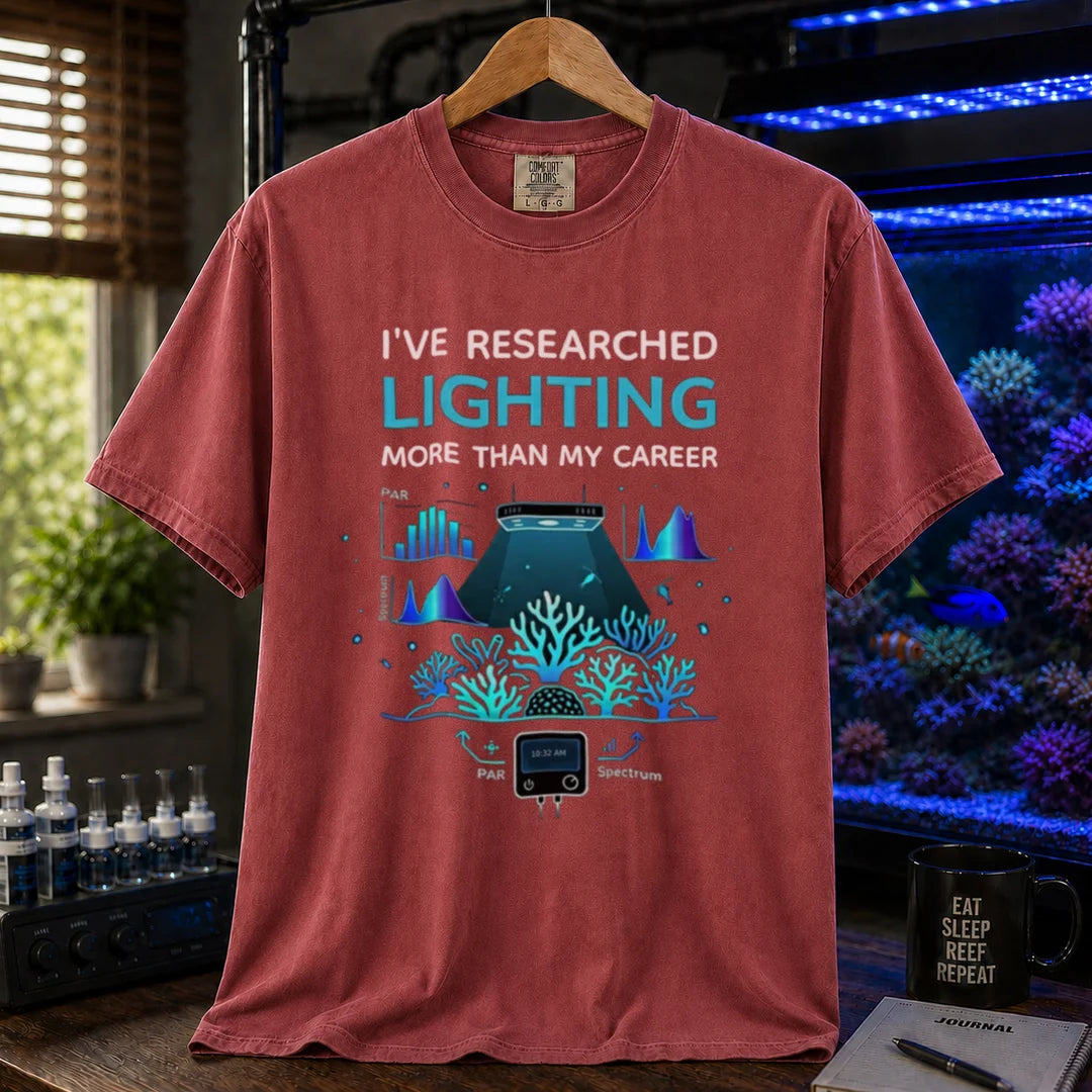 Saltwater aquarium graphic t-shirt featuring lighting and PAR graphs with text: I'VE RESEARCHED LIGHTING MORE THAN MY CAREER, maroon, red crew neck tee