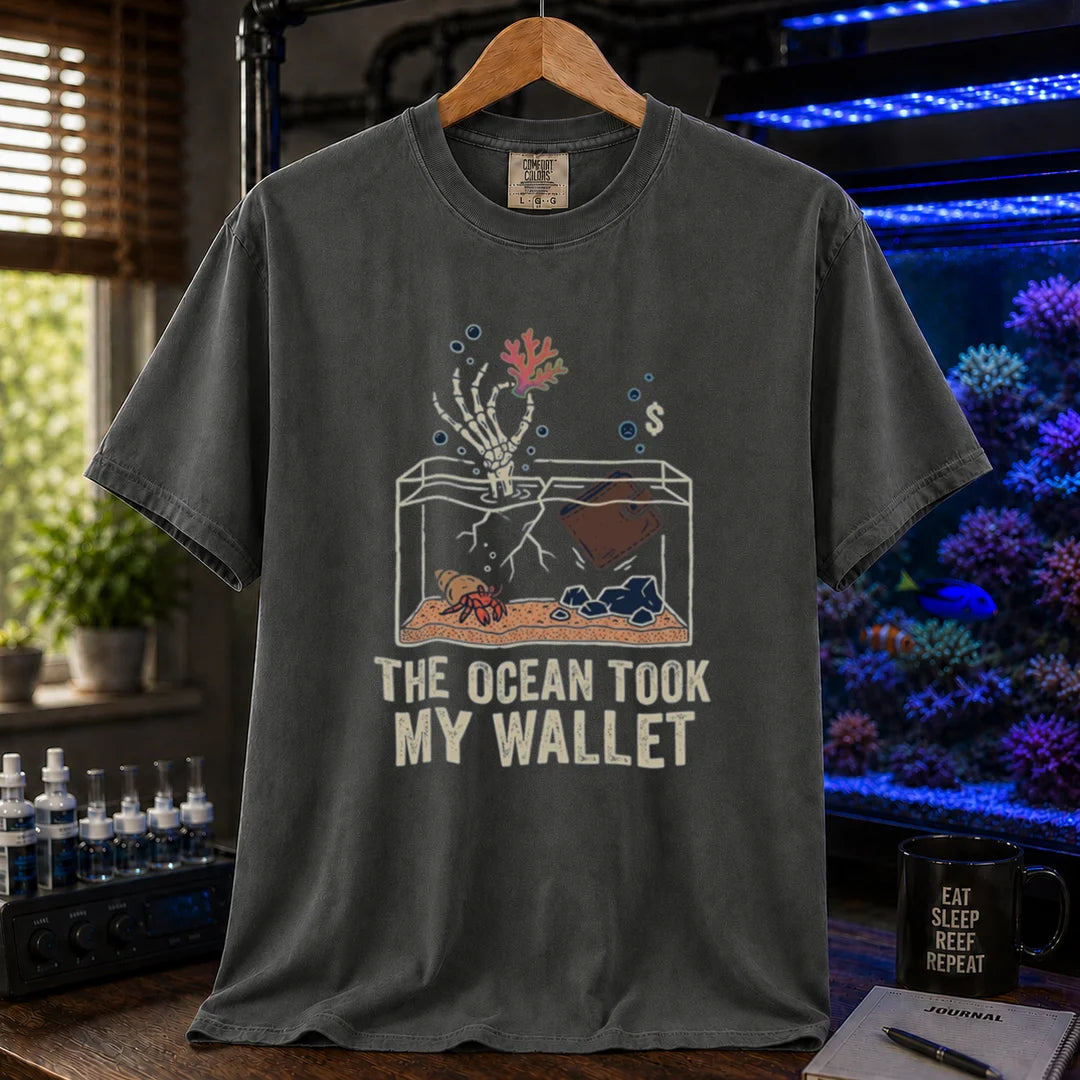 Saltwater aquarium graphic t-shirt featuring a skeleton hand and wallet in a tank illustration with text: THE OCEAN TOOK MY WALLET, dark grey crew neck tee