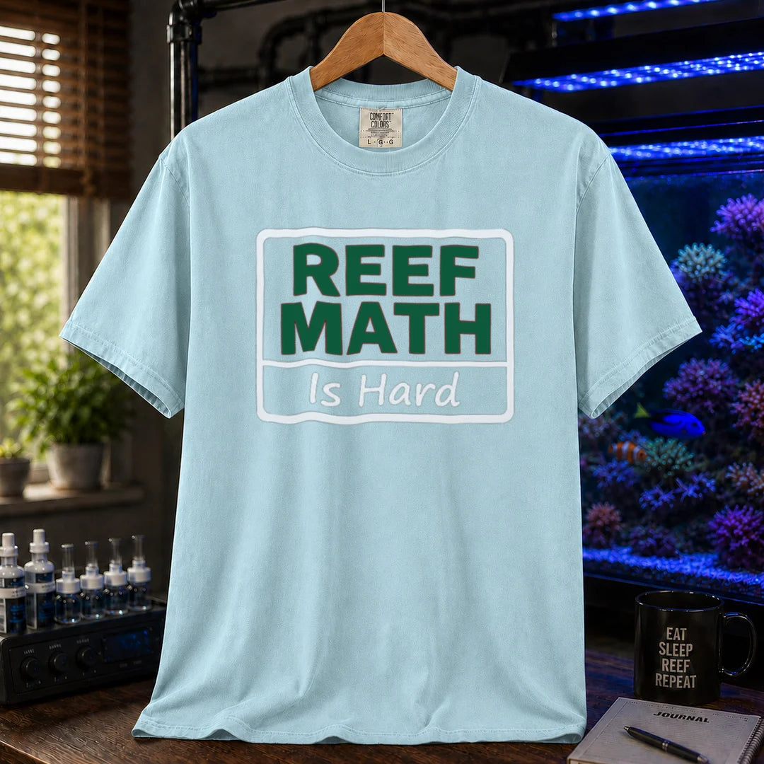 Saltwater aquarium graphic t-shirt featuring a boxed sign design with text: REEF MATH Is Hard, light blue crew neck tee