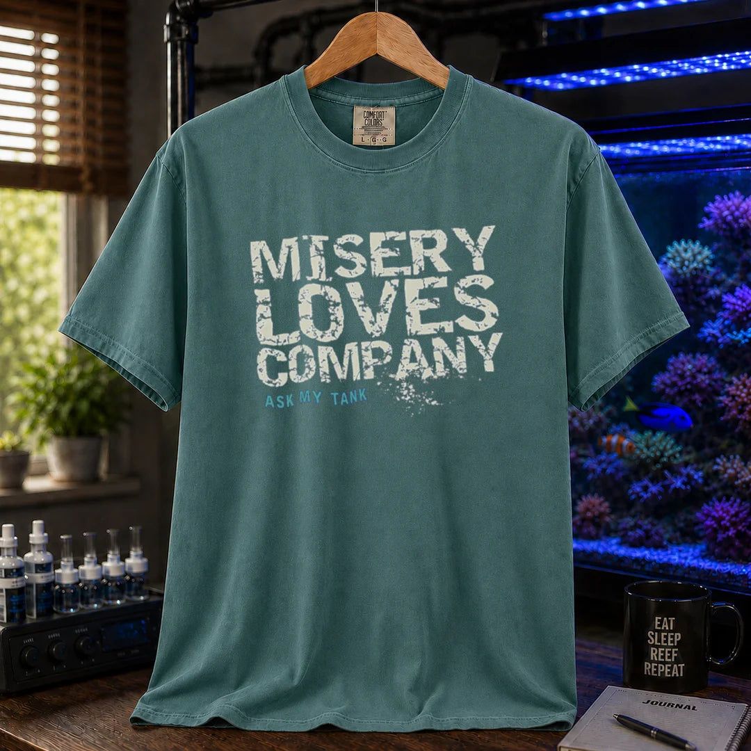 Saltwater aquarium graphic t-shirt featuring distressed block text: MISERY LOVES COMPANY ASK MY TANK, green crew neck tee