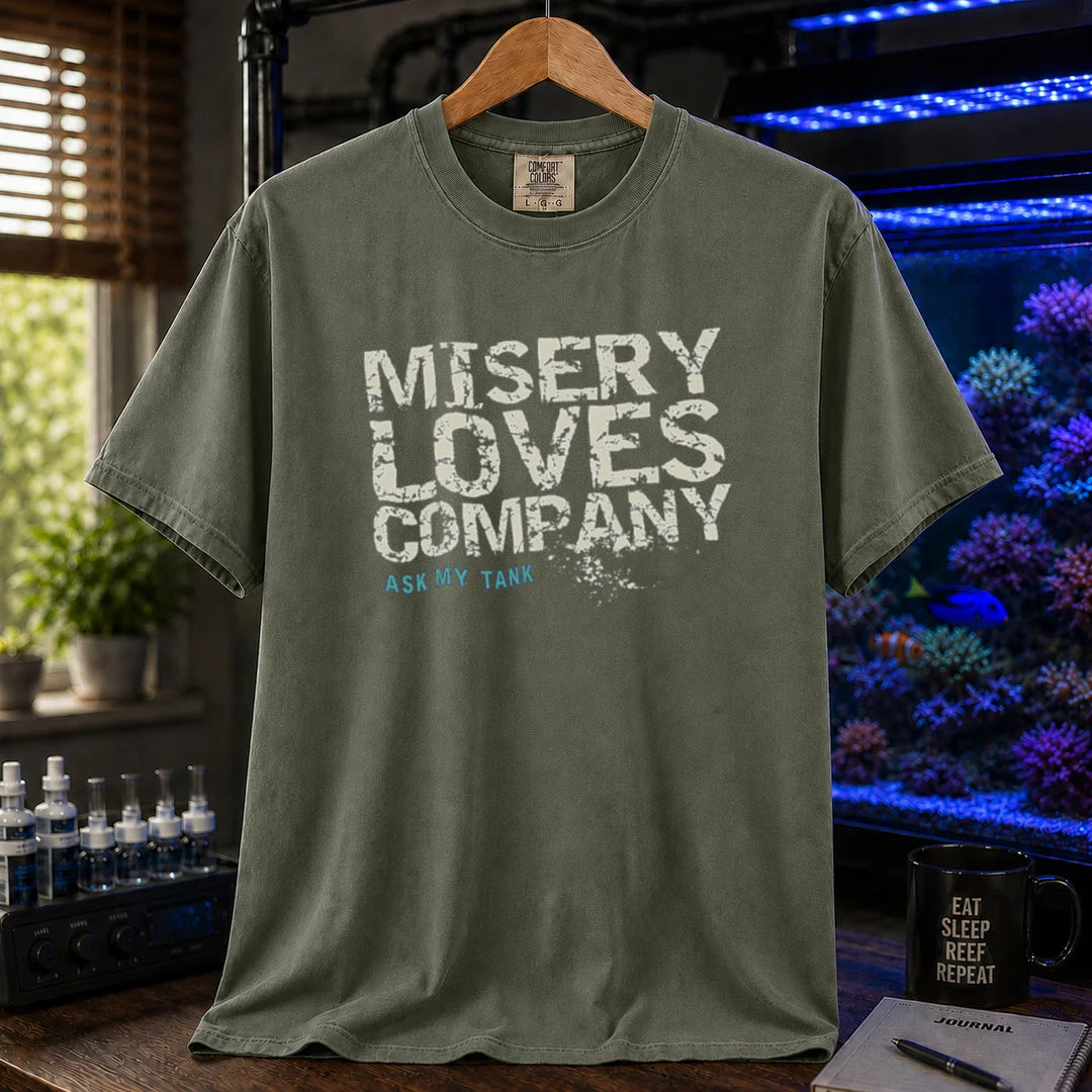 Saltwater aquarium graphic t-shirt featuring distressed block text: MISERY LOVES COMPANY ASK MY TANK, military green crew neck tee