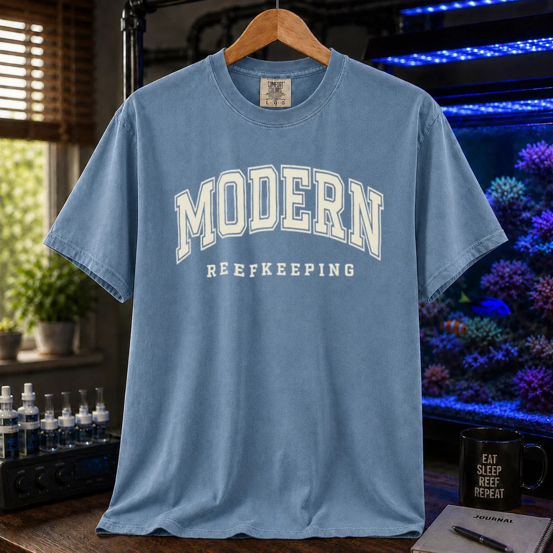 Saltwater aquarium graphic t-shirt featuring collegiate style arch text: MODERN REEFKEEPING, blue crew neck tee