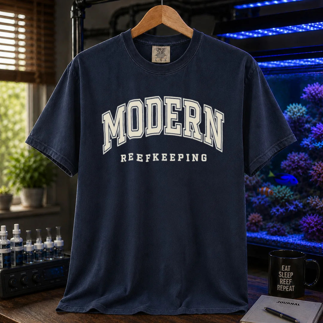 Saltwater aquarium graphic t-shirt featuring collegiate style arch text: MODERN REEFKEEPING, navy crew neck tee