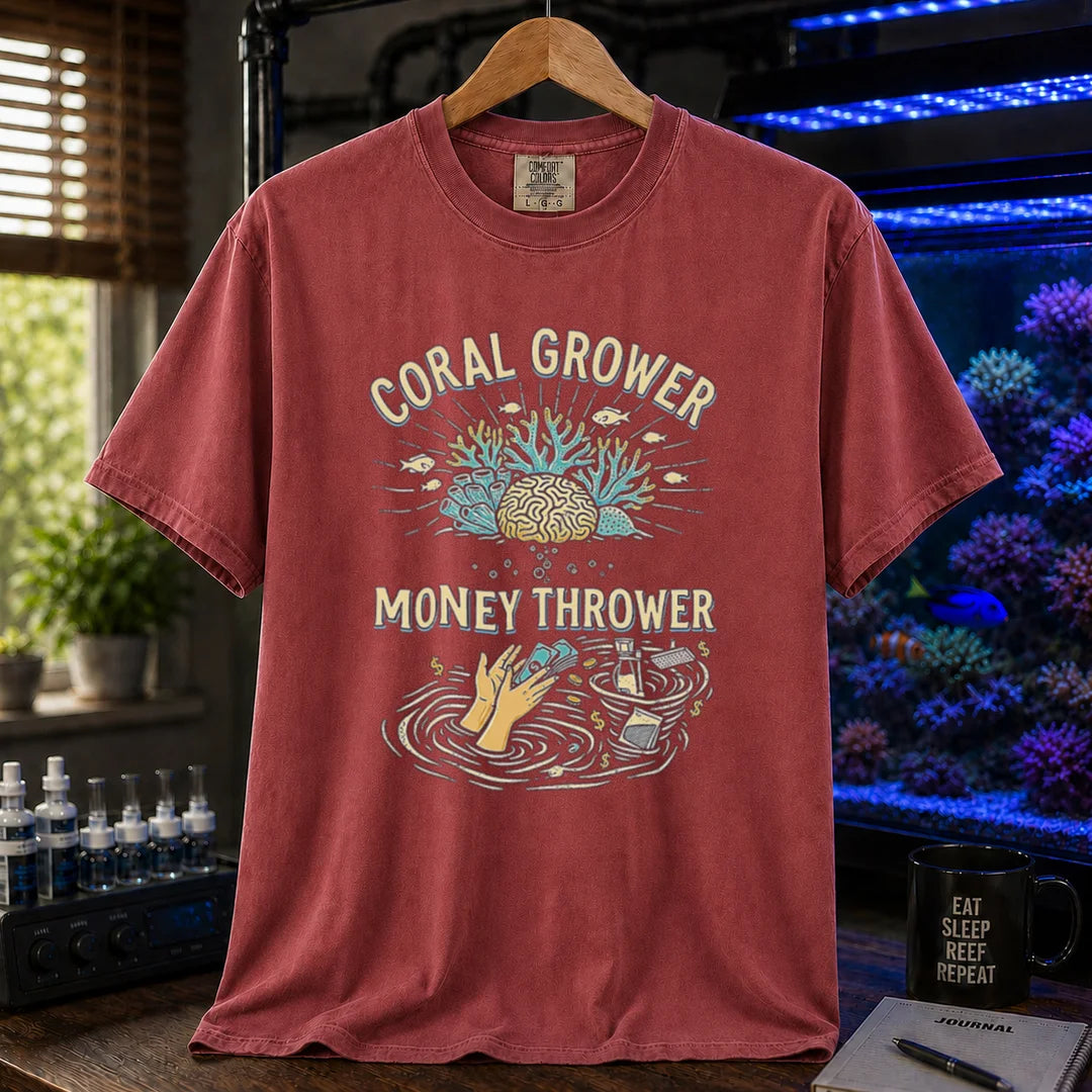 Saltwater aquarium graphic t-shirt featuring a two-part illustration of corals above and hands throwing cash into a gear whirlpool below with text: CORAL GROWER MONEY THROWER, maroon, red crew neck tee