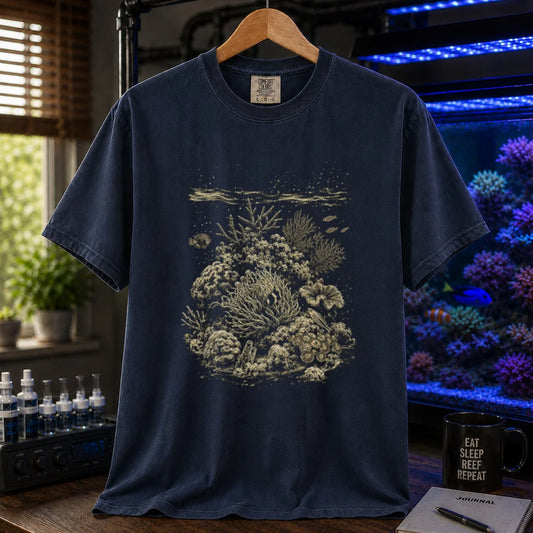 Saltwater aquarium graphic t-shirt featuring a detailed vintage scientific engraving of a coral reef ecosystem, navy crew neck tee