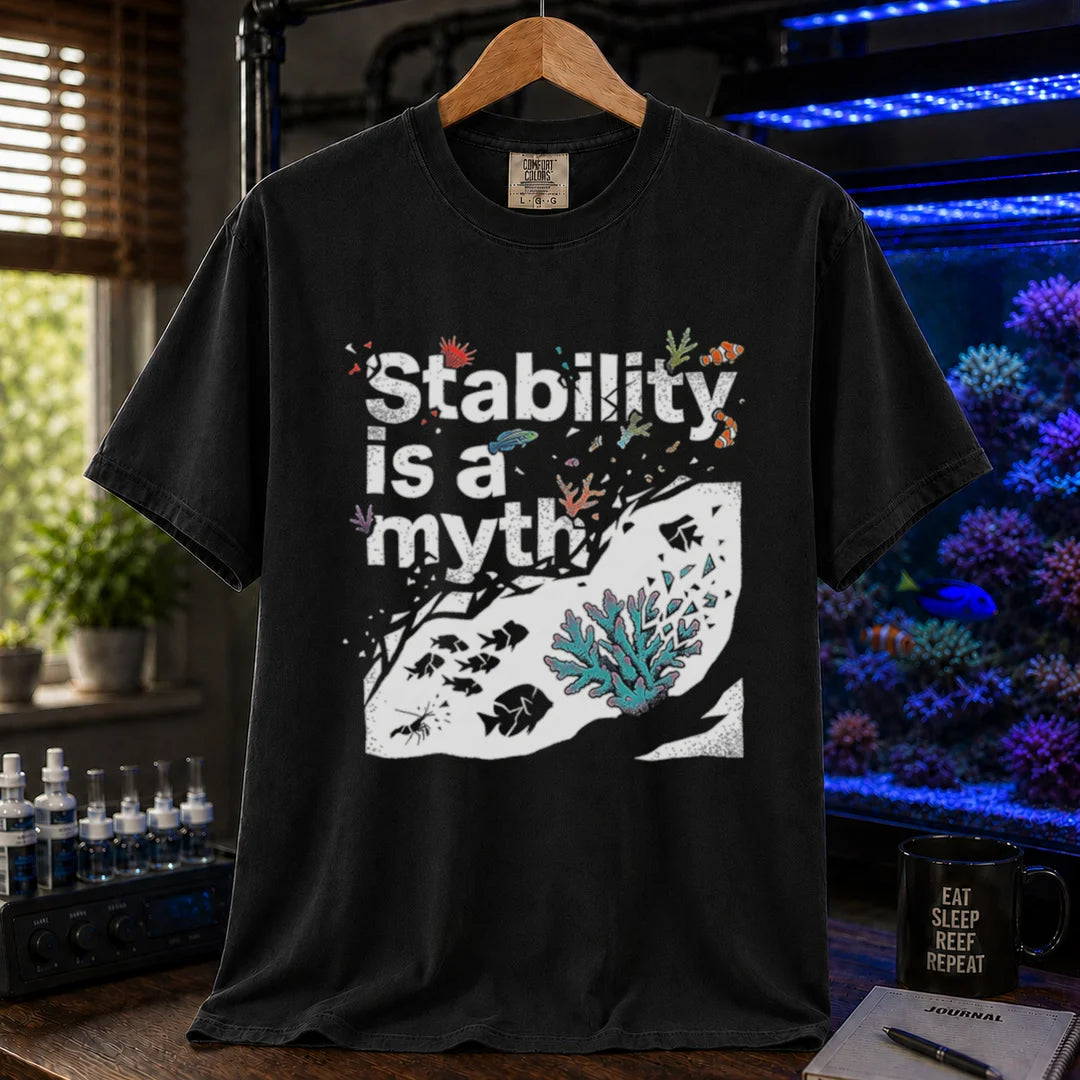 Saltwater aquarium graphic t-shirt featuring an abstract reef illustration and distressed text: Stability is a myth, black crew neck tee