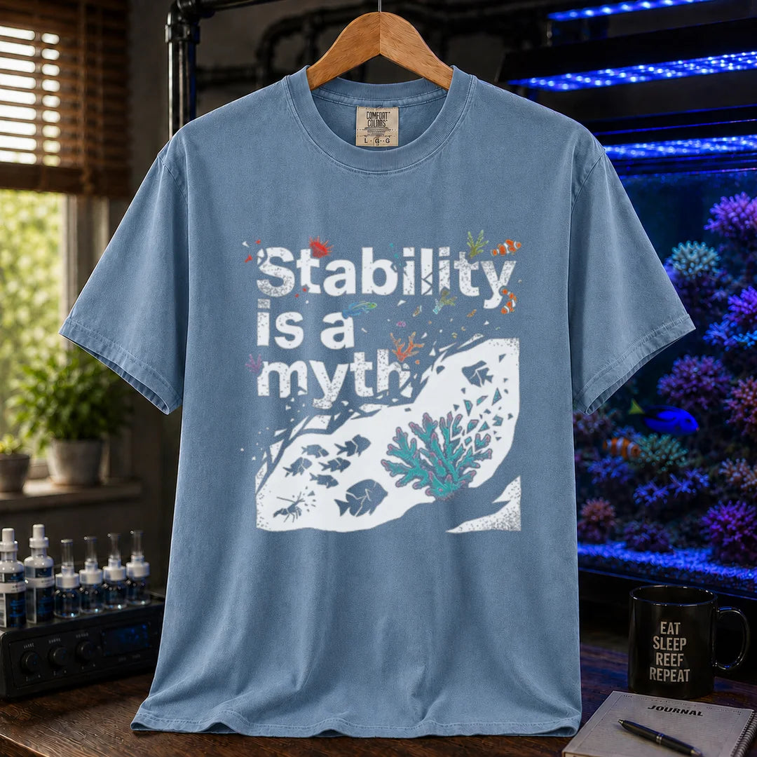 Saltwater aquarium graphic t-shirt featuring an abstract reef illustration and distressed text: Stability is a myth, blue crew neck tee