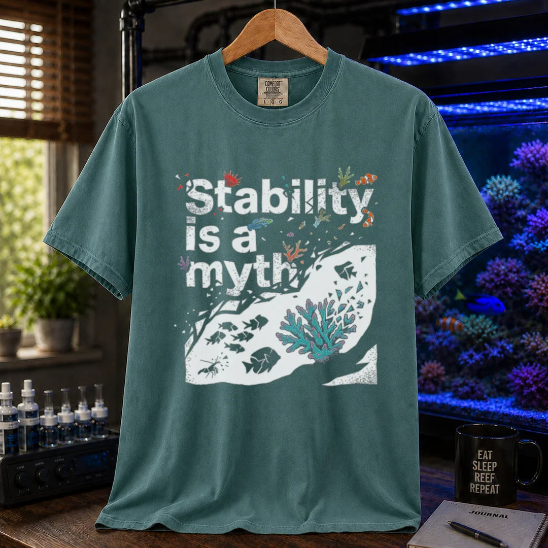 Saltwater aquarium graphic t-shirt featuring an abstract reef illustration and distressed text: Stability is a myth, green crew neck tee