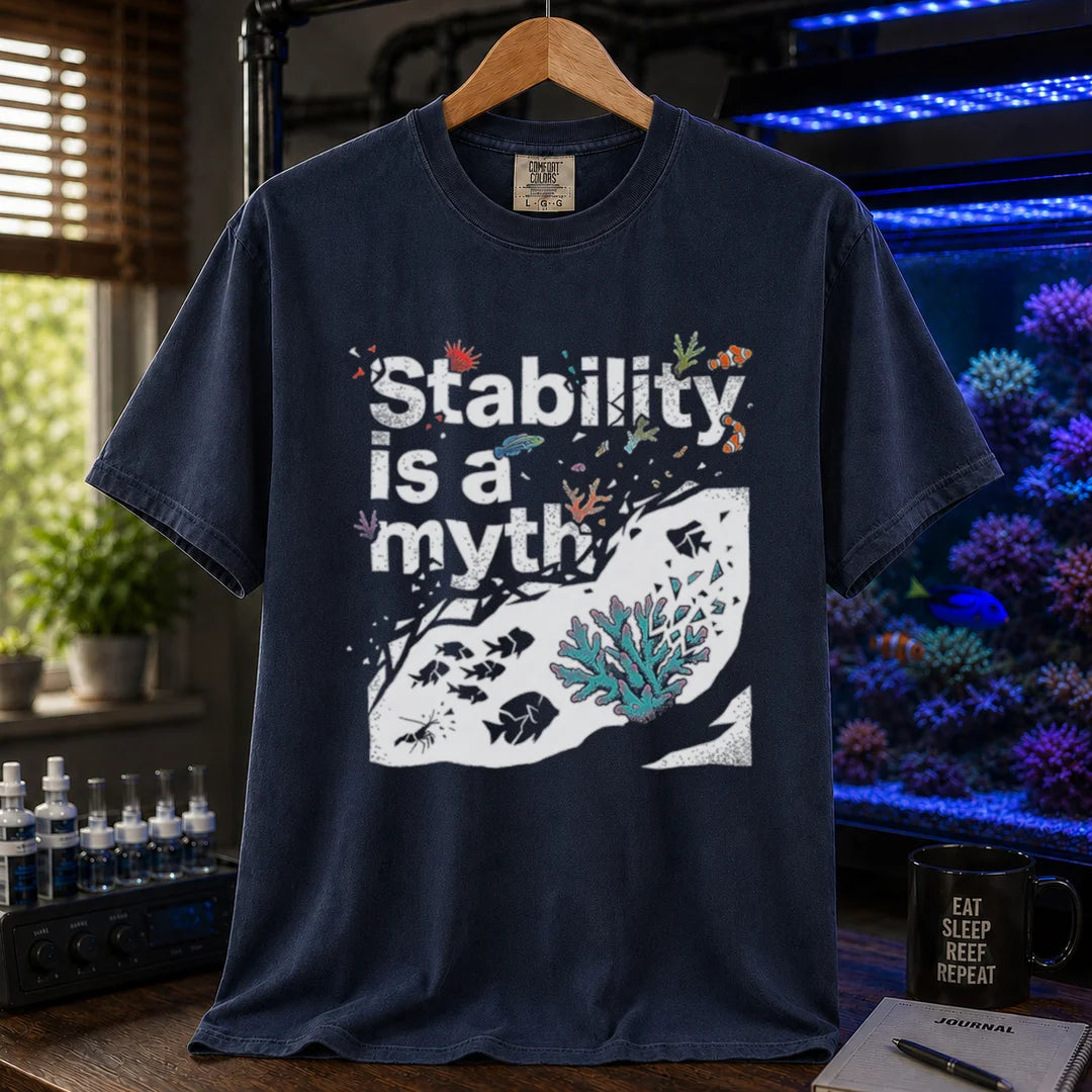 Saltwater aquarium graphic t-shirt featuring an abstract reef illustration and distressed text: Stability is a myth, navy crew neck tee