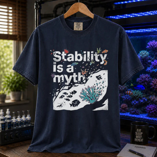 Saltwater aquarium graphic t-shirt featuring an abstract reef illustration and distressed text: Stability is a myth, navy crew neck tee